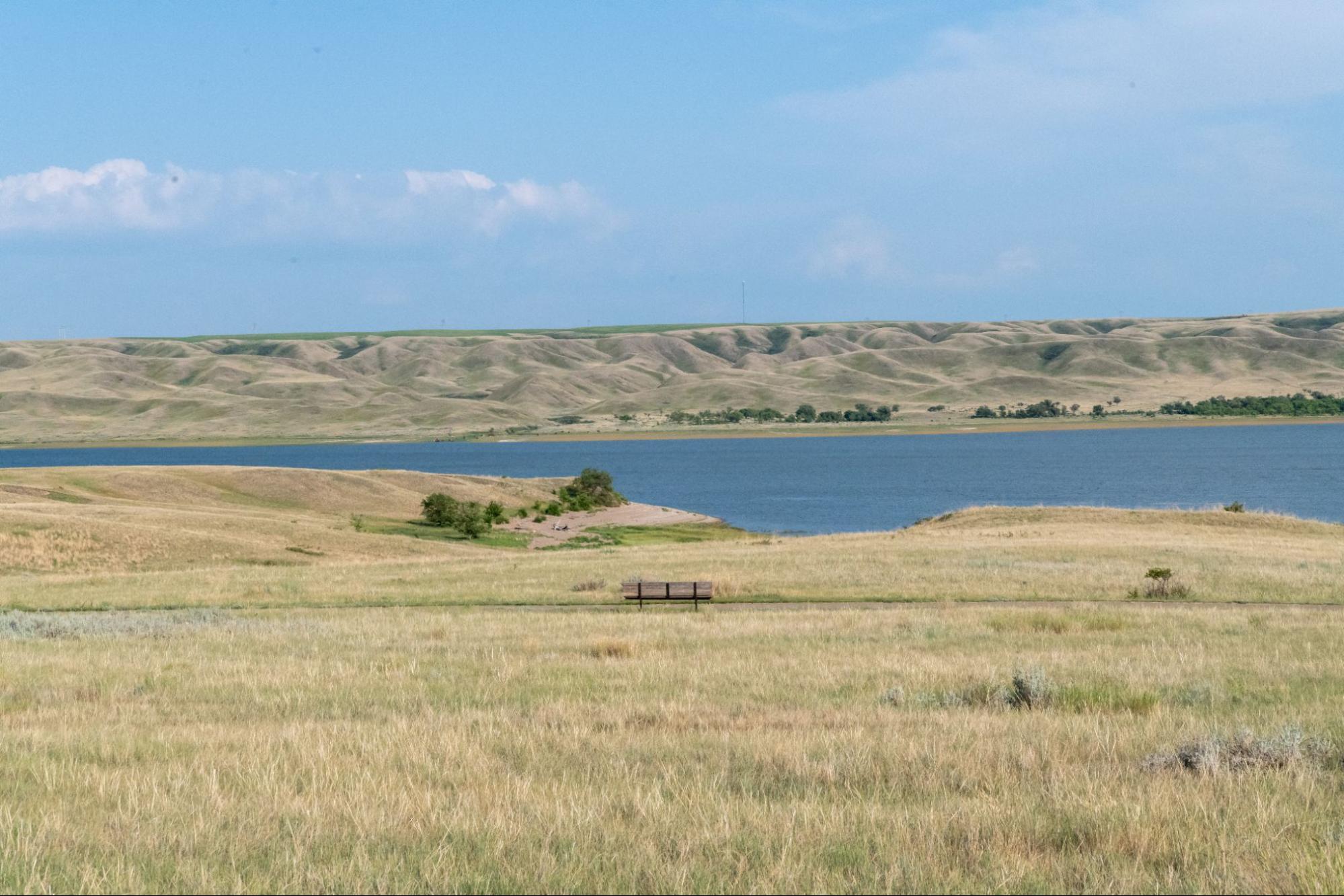 A broad view of the lake and mountains, perfect for autumn glamping.